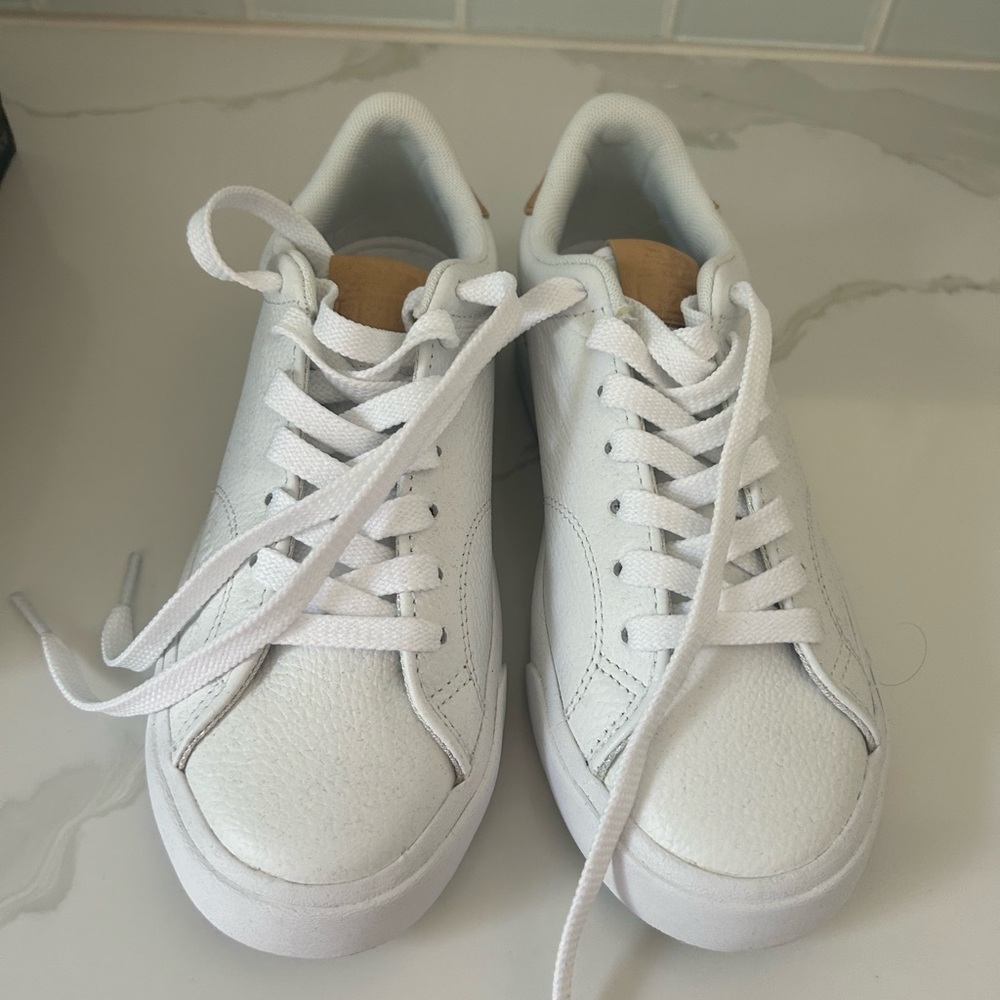 White new balance sneakers